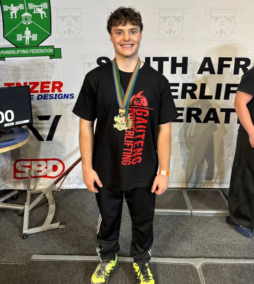 Alrich with his South African Powerlifting Federation medals