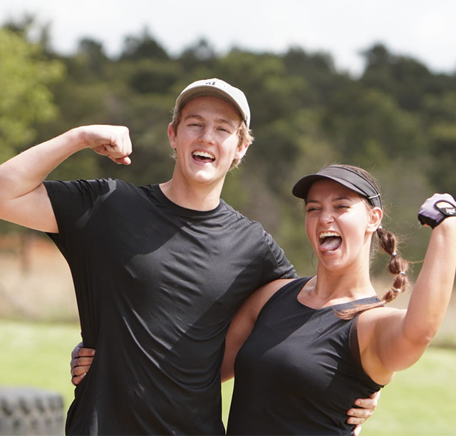 HYROX athletes celebrating after a training session